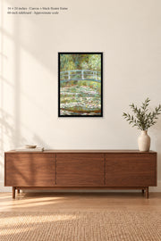 Bridge over a Pond of Water Lilies · 16 × 24 inches · Canvas + black floater frame · room mockup · approximate scale against 60-inch sideboard