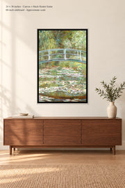 Bridge over a Pond of Water Lilies · 24 × 36 inches · Canvas + black floater frame · room mockup · approximate scale against 60-inch sideboard