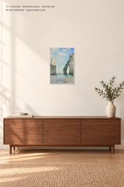 The Cliffs at Étretat · 12 × 18 inches · Stretched canvas · artwork only · room mockup · approximate scale against 60-inch sideboard