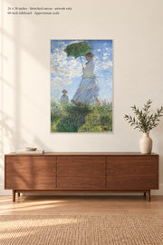 Woman with a Parasol · 24 × 36 inches · Stretched canvas · artwork only · room mockup · approximate scale against 60-inch sideboard