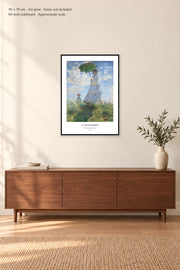 Woman with a Parasol · 50 × 70 cm · Art print · frame not included · room mockup · approximate scale against 60-inch sideboard