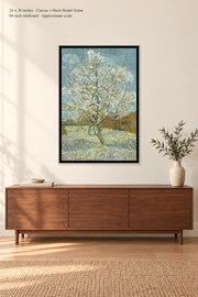 The Pink Peach Tree · 24 × 36 inches · Canvas + black floater frame · room mockup · approximate scale against 60-inch sideboard